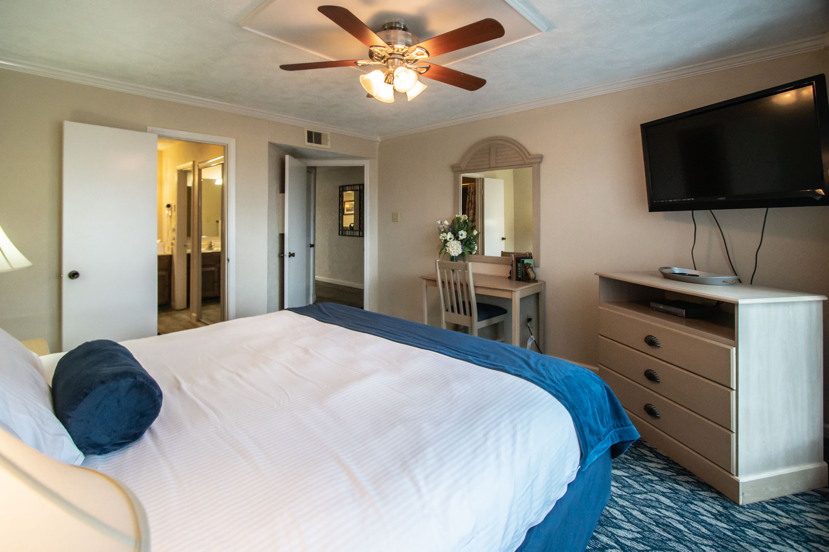 A spacious master bedroom at VRI's The Landing at Seven Coves in Willis, Texas.
